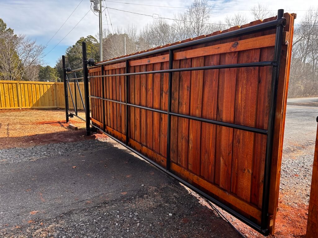 Board on board driveway slide gate